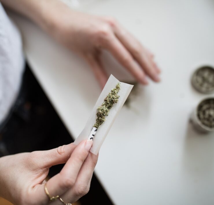 rolling a joint Thought Catalog