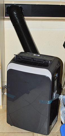Portable AC Unit with Easy Widow Kit Venting Can Save Your Ass in a Heatwave
