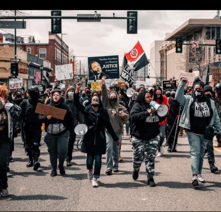 African American protesters marching in the streets
