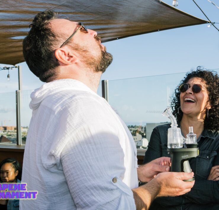 cannabis world news consumer education man exhaling dab hit of cannabis and woman laughing