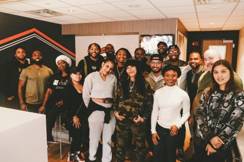 cannabis world news events group pf people of color posing in room