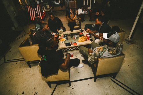cannabis world news events people sitting around table