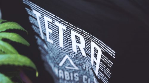 cannabis world news events image of t-shirt with Tetra printed on it and small print