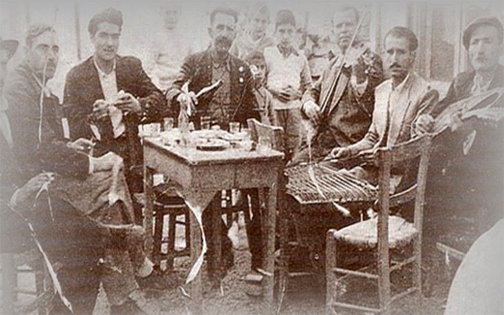 cannabis world news men sitting around table early 20th century