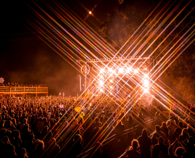 cannabis world news image of crowd in front of stage with sparking lightsa