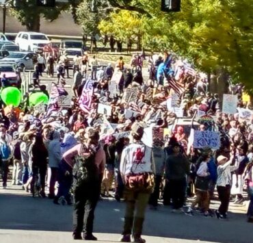 cannabis world news commentary image of protest march for No Kings