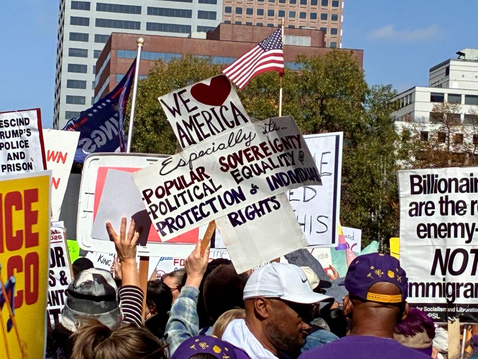 cannabis world news commentary image of 2025 No Kings protest signs