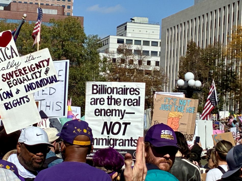 cannabis world news commentary people holding political protest signs
